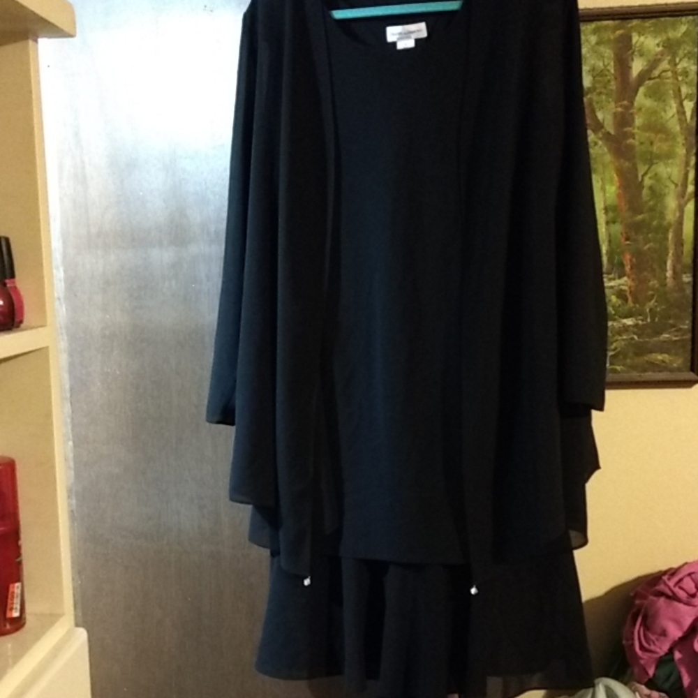 Black two piece shift dress with ruffled hem